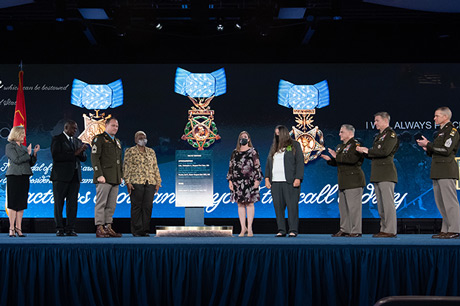 From left, Secretary of the U.S. Army Christine E. Wormuth; Secretary of Defense Lloyd J. Austin III; U.S. Army Master Sgt. Earl D. Plumlee; Kasinal Cashe White, sister of U.S. Army Sgt. 1st Class Alwyn C. Cashe; Katherine Celiz, spouse of U.S. Army Sgt. 1st Class Christopher A. Celiz; Tamara Cashe, spouse of Sgt. 1st Class Cashe; Chairman of the Joint Chiefs of Staff U.S. Army Gen. Mark A. Milley; Chief of Staff of the U.S. Army Gen. James C. McConville; and Sgt. Maj. of the U.S. Army Michael A. Grinston participate in a Medal of Honor Induction Ceremony at Joint Base Myer-Henderson Hall, Va., Dec. 17, 2021. The ceremony was held in honor of U.S. Army Sgt. 1st Class Alwyn C. Cashe, Sgt. 1st Class Christopher A. Celiz and Master Sgt. Earl D. Plumlee. (U.S. Army photo by Laura Buchta) 