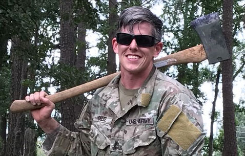 Sgt. 1st Class Christopher Celiz helping clear debris with fellow Soldiers following the aftermath of a hurricane. (Photo courtesy of Katie Celiz)