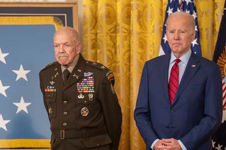 President Joseph Biden prepares to bestow the Medal of Honor to retired U.S. Army Col. Paris D. Davis during a ceremony at the White House in Washington, D.C., March 3, 2023. Col. Davis was awarded the Medal of Honor for acts of gallantry and intrepidity above and beyond the call of duty while serving as a detachment commander with the 5th Special Forces Group (Airborne), 1st Special Forces, during combat operations against an armed enemy in the vicinity of Bong Son, Republic of Vietnam, on June 17-18, 1965. (U.S. Army photo by Bernardo Fuller)
