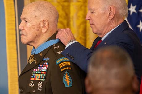 President Joseph Biden bestows the Medal of Honor to retired U.S. Army Col. Paris D. Davis during a ceremony in the East Room of the White House in Washington, D.C., March 3, 2023. Col. Davis was awarded the Medal of Honor for acts of gallantry and intrepidity above and beyond the call of duty while serving as a detachment commander with the 5th Special Forces Group (Airborne), 1st Special Forces, during combat operations against an armed enemy in the vicinity of Bong Son, Republic of Vietnam, on June 17-18, 1965. (U.S. Army photo by Bernardo Fuller)
