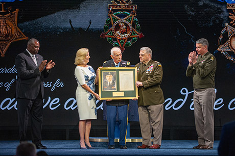 Retired U.S. Army Maj. John J. Duffy stands with senior DoD and U.S. Army leaders during his induction to the Pentagon’s Hall of Heroes at Conmy Hall on Joint Base Myer-Henderson Hall in Arlington, Virginia, July 6, 2022. In addition to Duffy, the inductees include former Specialists 5 Dwight Birdwell and Dennis Fujii, former Staff Sgt. Edward Kaneshiro, retired Col. Ralph Puckett and Sgt. Maj. Thomas Payne. (U.S. Army photo by Sgt. Henry Villarama)
