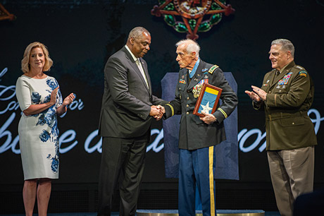 Secretary of the Army Christine Wormuth presents a photo and citation to Medal of Honor recipient retired Army Maj. John J. Duffy, in a ceremony in which Duffy and five other Medal of Honor recipients were inducted into the Pentagon Hall of Heroes, at Joint Base Myer-Henderson Hall, Va., July 6, 2022. (U.S. Army photo by Sgt. Henry Villarama)

