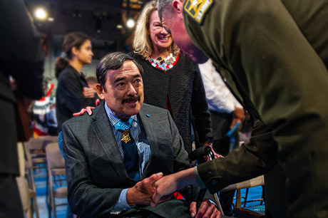 Medal of Honor recipient and former Spc. 5 Dennis Fujii shakes hands with the Vice Chief of Staff of the Army, Gen. Joseph Martin, after his induction to the Pentagon’s Hall of Heroes at Joint Base Myer-Henderson Hall in Arlington, Virginia, July 6, 2022. (U.S. Army photo by Sgt. Henry Villarama) 