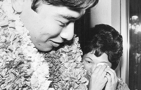Spc. 5 Dennis Fujii shares a moment with his mother after returning home to Hawaii from Vietnam in 1971. (Photo courtesy of the Fujii family)