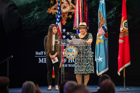 Mrs. Naomi Viloria and Mrs. Ashley Aczon-Skjelstad, family members of former U.S. Army Staff Sgt. and Medal of Honor recipient Edward Kaneshiro, delivers remarks during Kaneshiro's induction to the Pentagon's Hall of Heroes at Conmy Hall on Joint Base Myer-Henderson Hall in Arlington, Virginia, July 6, 2022. (U.S. Army photo by Sgt. Henry Villarama)
