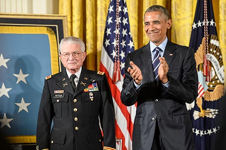 Retired U.S. Army Lt. Col. Charles Kettles is awarded the Medal of Honor at the White House in Washington, D.C., July 18, 2016, for actions during a battle near Duc Pho, South Vietnam, on May 15, 1967. Then-Maj. Kettles, assigned to 1st Brigade, 101st Airborne Division, was credited with evacuating dozens of Soldiers in a UH-1D Huey helicopter under intense enemy fire. Photo by Sgt. Alicia Brand