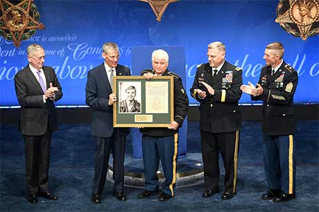 Acting Secretary of the Army Robert M. Speer presents a citation to former Spc. 5 James C. McCloughan during the Medal of Honor Induction Ceremony at the Pentagon, in Arlington, Va., Aug. 1, 2017. McCloughan was awarded the Medal of Honor for distinguished actions as a combat medic assigned to Company C, 3rd Battalion, 21st Infantry Regiment, 196th Infantry Brigade, Americal Division, during the Vietnam War near Don Que, Vietnam, from May 13 to 15, 1969. U.S. Army photo by Spc. Tammy Nooner