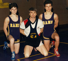 Coach James McCloughan (center) poses with his two sons, Matthew (left) and Jamie (right) at South Haven High School in 1988. (Photo courtesy of former U.S. Army Spc. 5 James McCloughan)