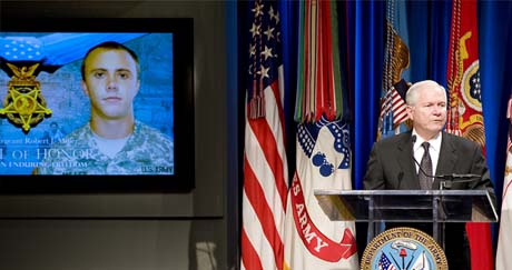 Defense Secretary Robert M. Gates addresses the audience during a Medal of Honor ceremony for U.S. Army Staff Sgt. Robert J. Miller at the Pentagon, Oct. 7, 2010. President Barack Obama posthumously awarded Miller the nation