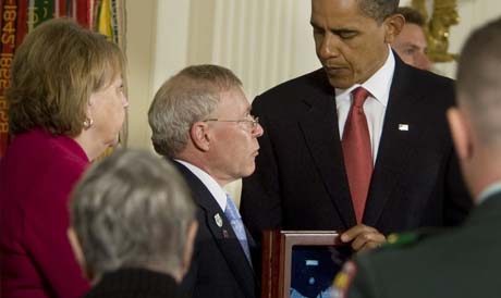 President Barack Obama posthumously awards Sgt. 1st. Class Jared C. Monti, from Raynham, Mass., the Medal of Honor to his parents, Paul and Janet Monti, in the East Room of the White House in Washington D.C., Sept. 17, 2009. (Photo Credit: U.S. Army)