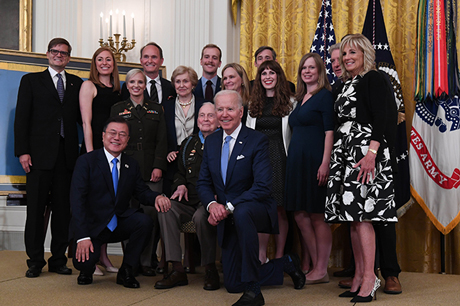 President Joseph Biden presents the Medal of Honor to retired Col. Ralph Puckett Jr. during a ceremony at the White House in Washington, D.C., May 21, 2021. Puckett was awarded the Medal of Honor for his heroic actions while serving then as commander of the Eighth Army Ranger Company when his company of 57 Rangers was attacked by Chinese forces at Hill 205 near the Chongchon River, during the Korean Conflict on November 25-26, 1950. (Spc. XaViera Masline)