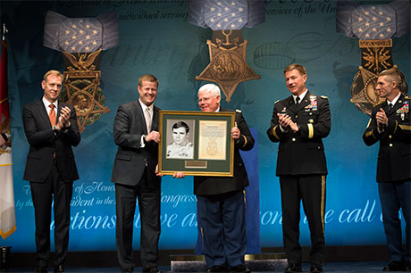 Acting secretary of the Army Ryan McCarthy presents a citation to retired Capt. Gary Rose during the Hall of Heroes Induction Ceremony at the Pentagon, in Arlington, Va., Oct. 24, 2017. Rose was awarded the Medal of Honor Oct. 23, 2017, for actions during Operation Tailwind in Southeastern Laos during the Vietnam War, Sept. 11-14, 1970. Then-Sgt. Rose was assigned to the 5th Special Forces Group (Airborne) at the time of action. U.S. Army photo by John Martinez
