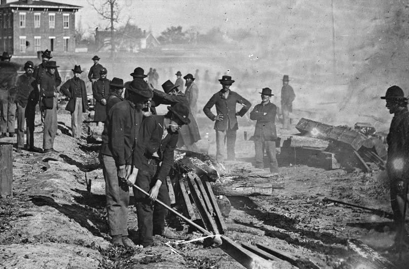 During the Civil War, the standard means of capturing a city was by seige, cutting it off from supplies and reinforcements. Followed by artillery bombardment and direct assault by massed infantry. Photo of Gen. Sherman's men destroying railroad tracks leading to Atlanta, Georgia. 1864. Photo courtesy of the Library of Congress.