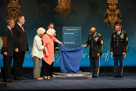 Ina Bass, third from left, and Elsie Shemin-Roth represent their father, Sgt. William Shemin;  while Command Sgt. Maj. Louis Wilson, second from right, New York Army National Guard, represents World Pvt. Henry Johnson, as they are inducted into the Hall of Heroes at the Pentagon, June 3, 2015.
U.S. Army photo by Staff Sgt. Bernardo Fuller