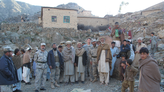 Capt. William Swenson conducts an Afghan Border Police humanitarian aid air-drop to a remote, mountain border-village, March 2009.