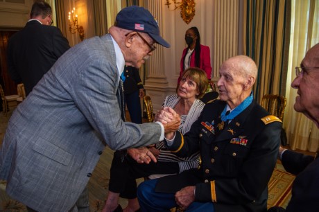 Former U.S. Army Capt. Larry L. Taylor speaks with retired U.S. Army colonel and Medal of Honor recipient Paris D. Davis after receiving the Medal of Honor at the White House in Washington, D.C., Sept. 5, 2023. Taylor was awarded the Medal of Honor for his acts of gallantry and intrepidity above and beyond the call of duty while serving as then-1st Lt. Taylor, a team leader assigned to Troop D (Air), 1st Squadron, 4th Cavalry, 1st Infantry Division, near the hamlet of Ap Go Cong, Republic of Vietnam, June 18, 1968. (U.S. Army photo by Henry Villarama)
