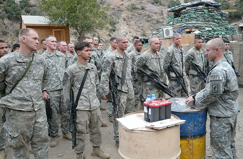 Members of 1st Platoon, Chosen Company, 2nd Battalion (Airborne), 503rd Infantry Regiment, 173rd Airborne Brigade gather for a ceremony in Nuristan Province, Afghanistan, Nov. 6, 2007. 