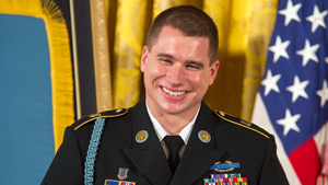 Former Sgt. Kyle J. White laughs as the President talks about his family during the Medal of Honor ceremony at the White House, Washington, D.C., May 13, 2014. White is being awarded the Medal of Honor for his actions while on a dismounted movement i...