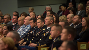 Family members and soldiers shed tears while former Sgt. Kyle J. White, the most recent Medal of Honor recipient, makes remarks during a ceremony to induct him into the Hall of Heroes at the Pentagon, May 14, 2014. White told stories of each of his f...