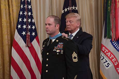 President Donald J. Trump presents the Medal of Honor to U.S. Army Master Sgt. Matthew O. Williams during a ceremony at the White House in Washington, D.C., Oct. 30, 2019. Williams was awarded the Medal of Honor for his actions while serving as a weapons sergeant with the Special Forces Operational Detachment Alpha 3336, Special Operations Task Force-33, in support of Operation Enduring Freedom in Afghanistan on April 6, 2008. (Photo Credit: Sgt. Keisha Brown)