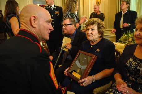 Senior Enlisted Advisor to the Chairman of the Joint Chiefs of Staff, U.S. Marine Corps Sgt. Maj. Troy E. Black, greets Theresa Chandler and her guests during a reception in the State Dining Room following a Medal of Honor ceremony at the White House in Washington, D.C., July 3, 2024. Theresa holds the Medal of Honor of her great-great-grandfather, U.S. Army Pvt. George D. Wilson, who was awarded for his acts of valor during the April 1862 "Great Locomotive Chase" in the Civil War. U.S. Army photo by Henry Villarama.