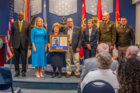Theresa Chandler, the great-great-granddaughter of U.S. Army Pvt. George D. Wilson, receives the Medal of Honor plaque on behalf of her ancestor during the Hall of Heroes Induction Ceremony at the Pentagon in Arlington, Va., July 4, 2024. U.S. Army photo by Bernardo Fuller.