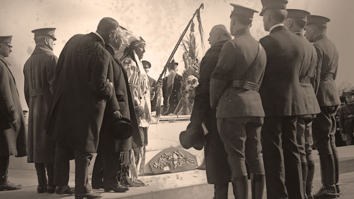 Image of Crow chief Plenty Coups blessing at the Tomb of the Unknown Soldier. 1921.