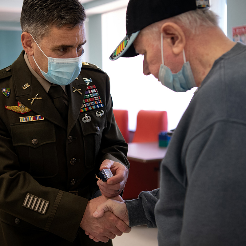 Image Showing Veterans at pinning event