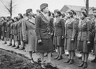 The first Black American Women Army Corps unit, the 688th Central Postal Battalion, in formation.