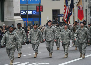 Col. Stephanie Dawson, the first female brigade commander in the New York Army National Guard, takes command of the 369th Sustainment Brigade, known as the Harlem Hellfighters, Nov. 16.