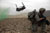 Soldier provides security before boarding a CH-47 Chinook helicopter