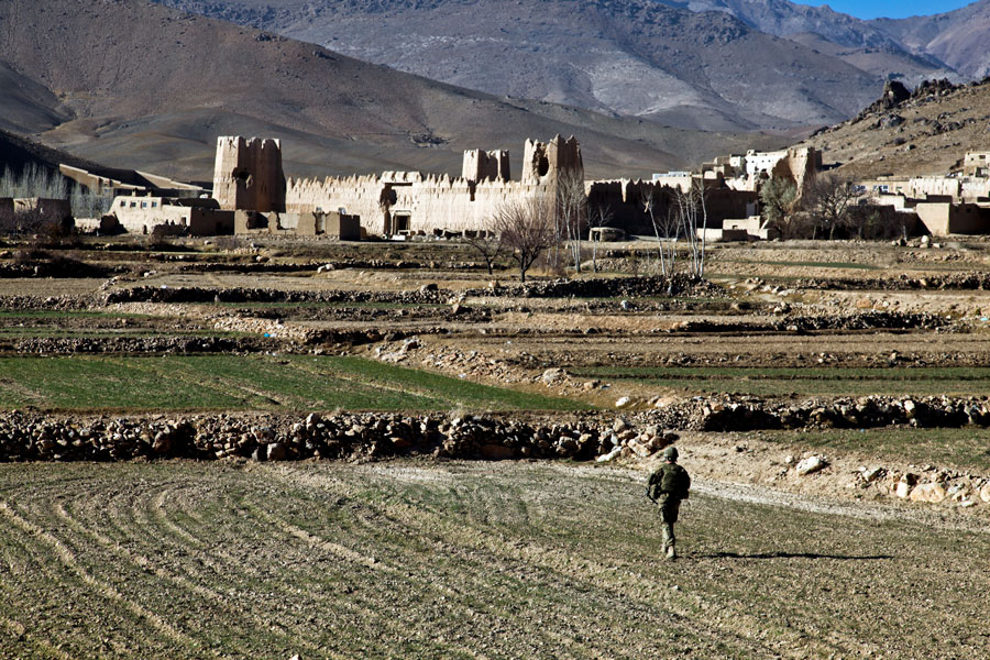 Soldier walks to village of Dahanah, Wardak Province, Afghanistan