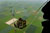 Soldiers parachute from C-130J Hercules aircraft