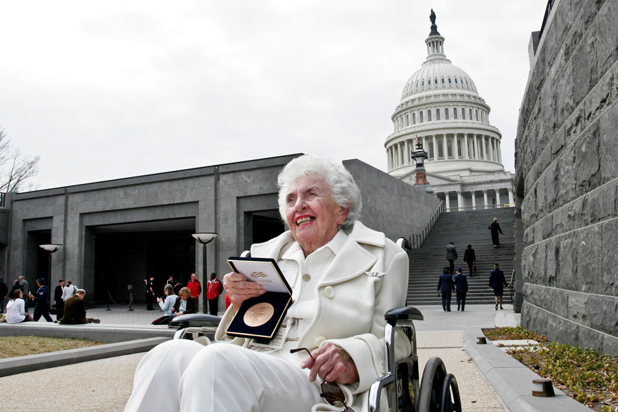 Vivian Cadman Eddy shows the Congressional Gold Medal