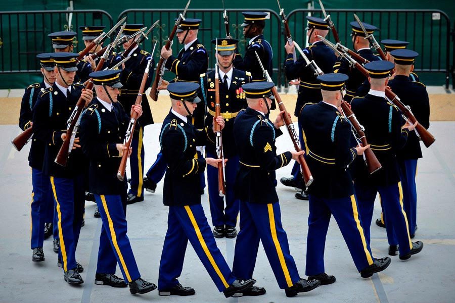 The United States Army Drill Team, 3rd United States Infantry Regiment (The Old Guard), performs in the 4th Annual Joint Service Drill Exhibition