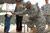 Major General Michael T. Harrison high fives a toddler displaced by the Great East Earthquake in Matsushima, Japan