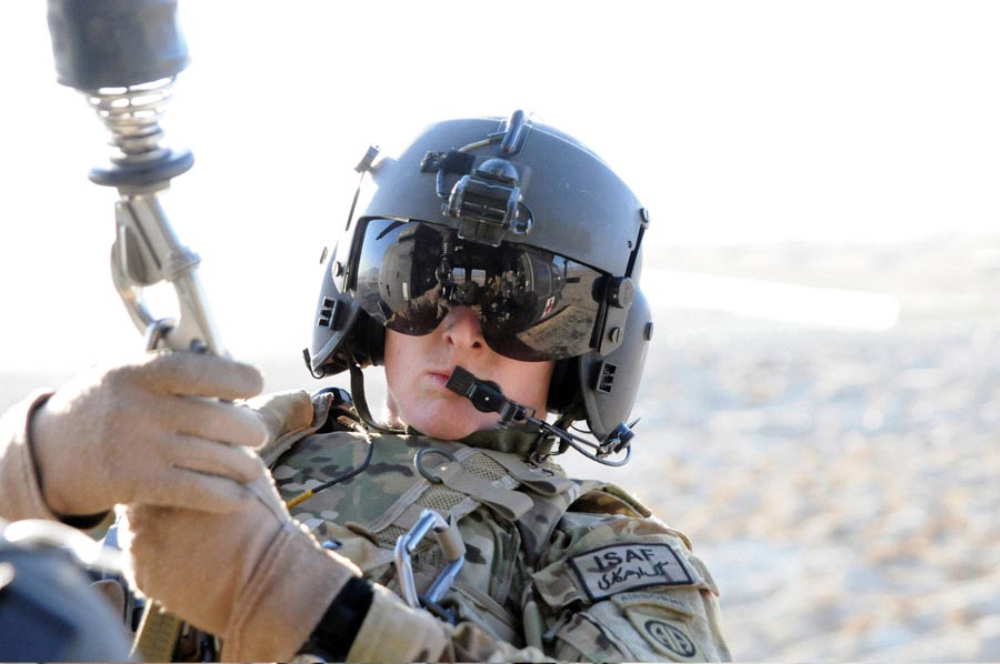 Specialist Aaron King is hoisted back into a UH-60 Black Hawk helicopter