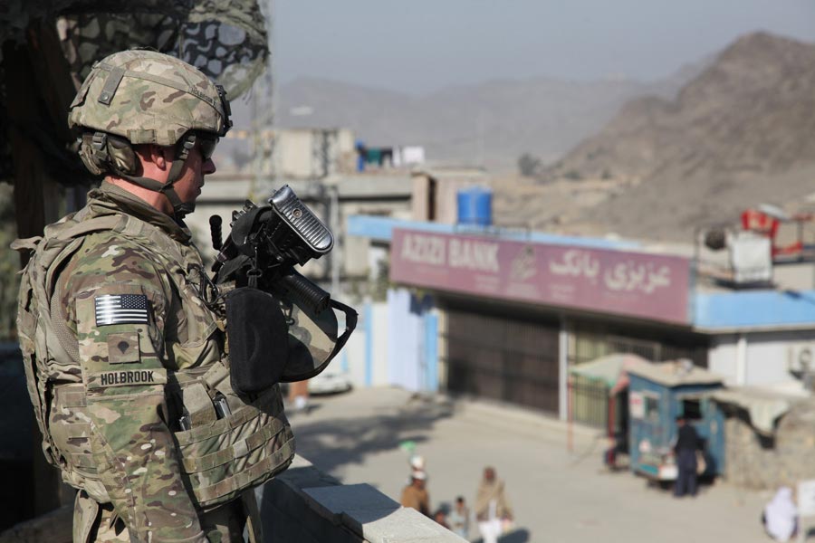 Specialist Jeremiah Holbrook provides security near Torkham Gate, Nangarhar province, Afghanistan