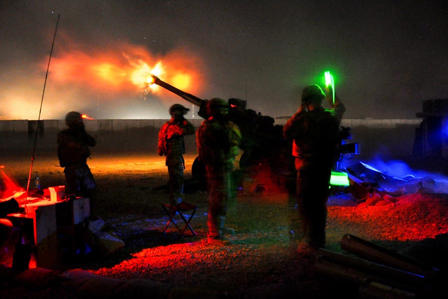 Soldiers of 3rd platoon, Bravo Battery of the Automatic Battalion, 2nd Battalion, 8th Field Artillery Regiment, lit up the Zabul province night by firing illumination from their M777A2, 155 mm howitzer