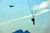 Paratroopers of the 1st Battalion (Airborne), 501st Infantry Regiment, conduct a parachute training and water landing exercise at Big Lake, Alaska