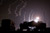 A combat observation lasing team calls in illumination rounds from nearby mortars during training at Fort Bragg, North Carolina