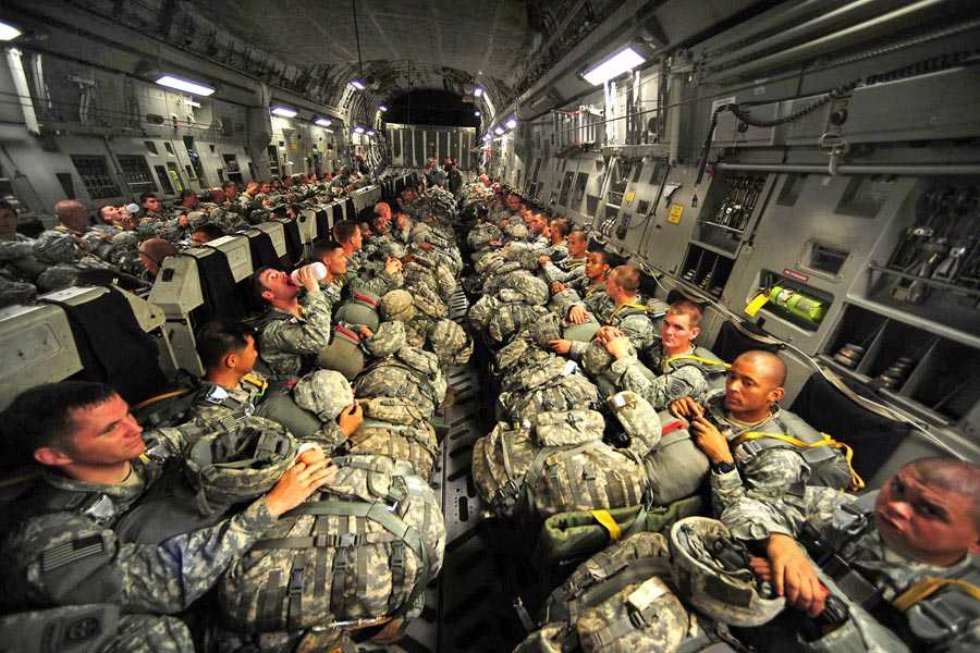 Soldiers assigned to the 82nd Airborne Division wait to perform personnel airdrops during a Joint Operations Access Exercise