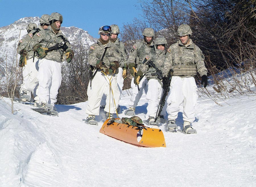 Soldiers learn to use rescue equipment in Alaska’s harsh winter conditions in a Cold Weather Leaders Course