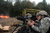 Private Stephen Justice acts as an assistant gunner and feeds rounds through a M240B machine gun