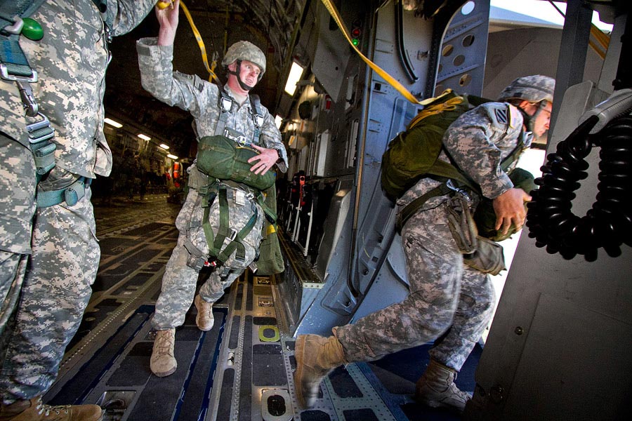 Paratroopers exit a C-17 Globemaster III during an airborne training exercise