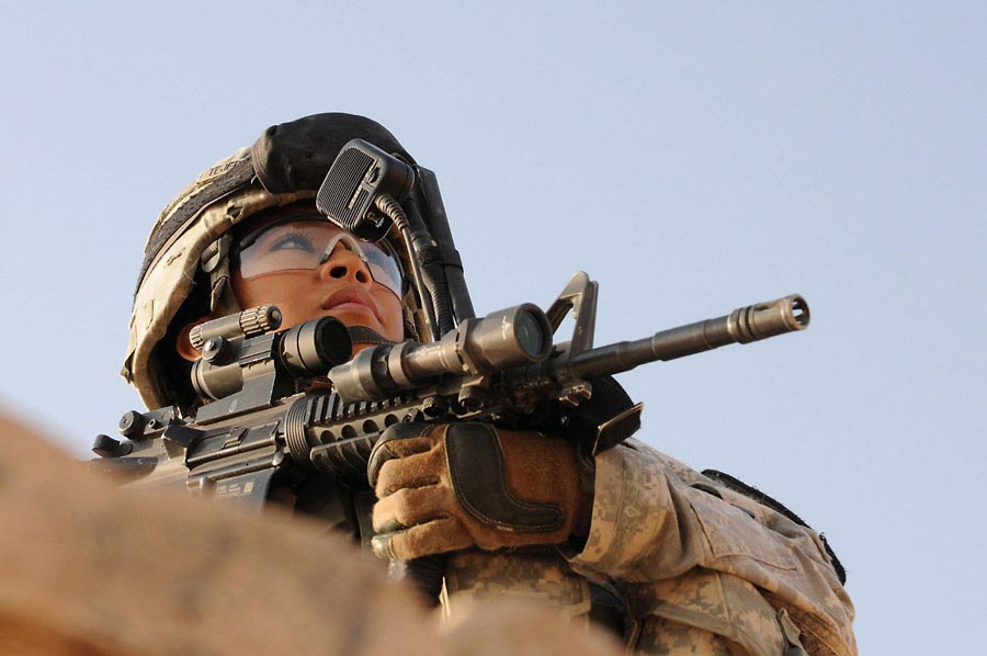 Corporal Kristine Tejada, a truck commander, provides security at the ancient Ziggurat of Ur, Iraq