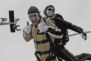 Staff Sergeant Joe Jones and Staff Sergeant Salvatore Giunta go on tandem parachute jump