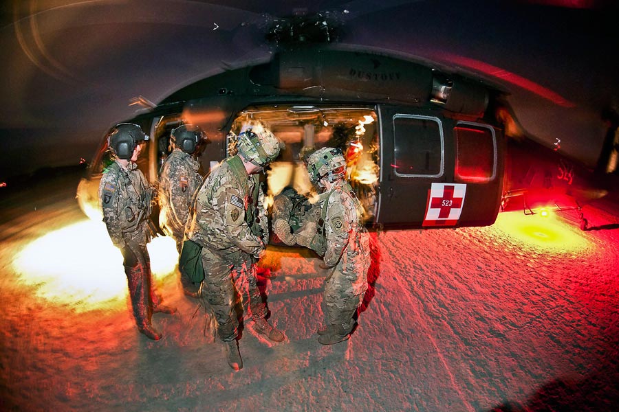 Medics with 82nd Airborne Division retrieve notionally-wounded paratroopers from Black Hawk medevac helicopter