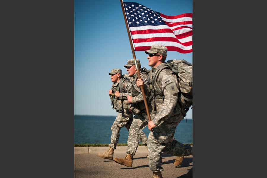Members of 191st Military Police Company, race toward finish line of Fallen Soldiers Memorial 12K run