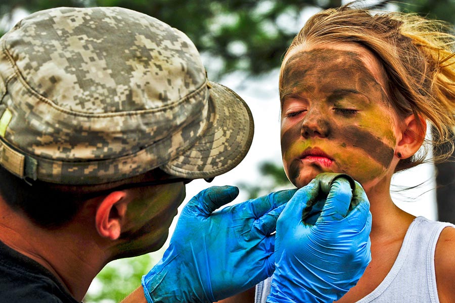 Soldier transforms 7-year-old Kayiah into camouflaged Army Ranger